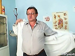 Mature Olga has her redhead hairy pussy gyno speculum examined by gyno doctor